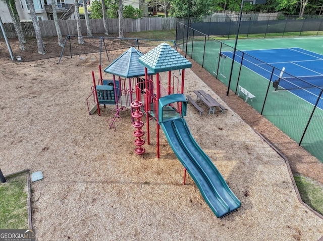 view of playground with tennis court