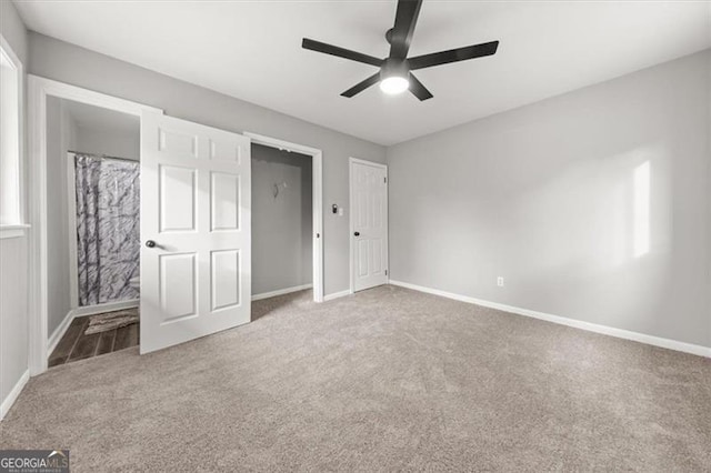 unfurnished bedroom with carpet floors and ceiling fan