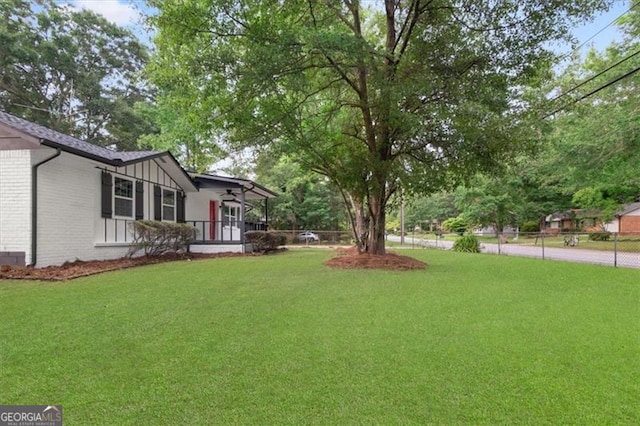 view of yard featuring a porch