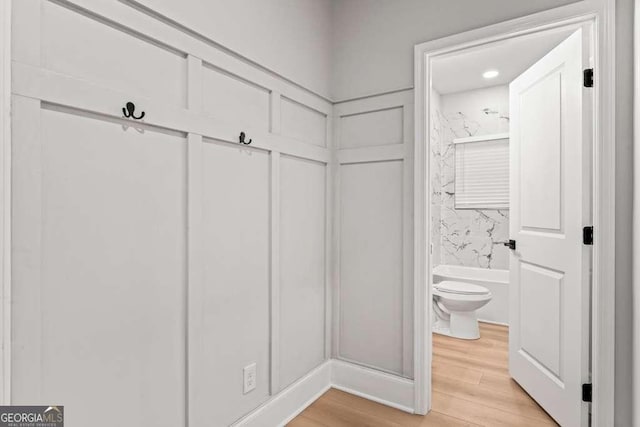 mudroom with light hardwood / wood-style flooring