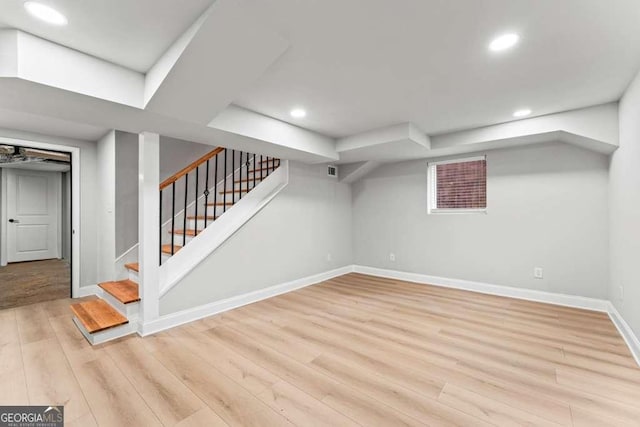 basement with light wood-type flooring