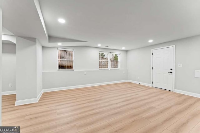 basement featuring light hardwood / wood-style floors