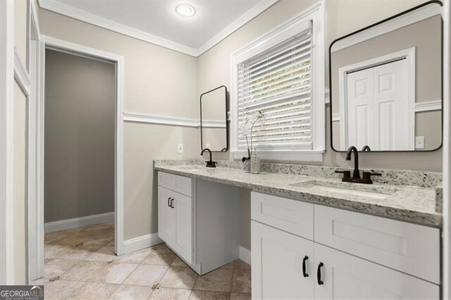 bathroom featuring vanity and crown molding