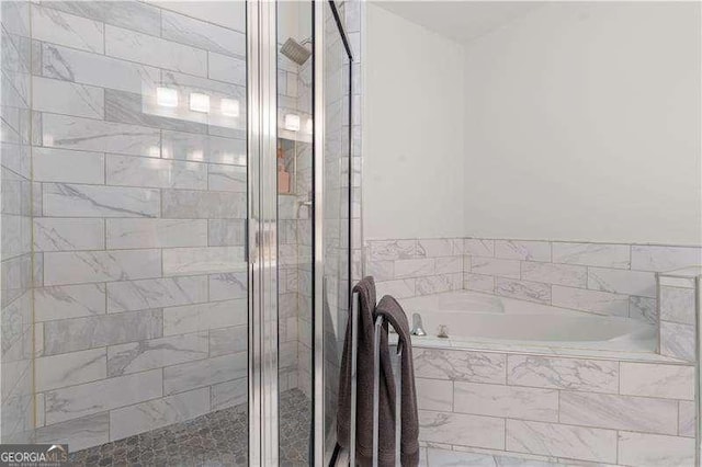 bathroom with independent shower and bath