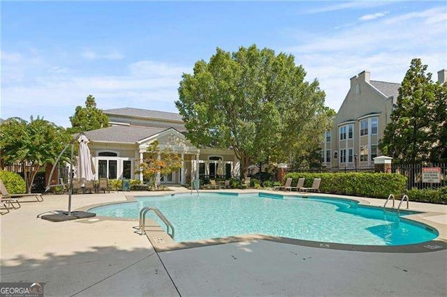 view of pool featuring a patio