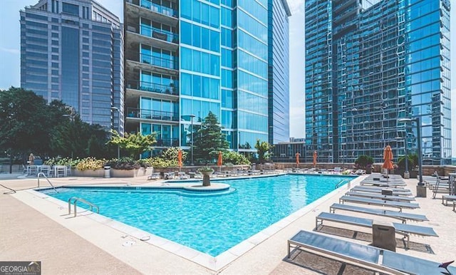 view of pool with a patio area