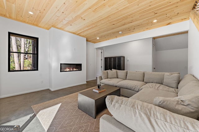 living room with concrete floors and wooden ceiling