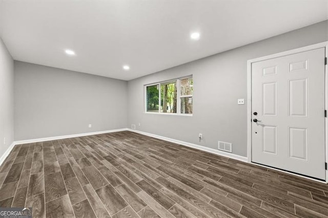 interior space with dark wood-type flooring