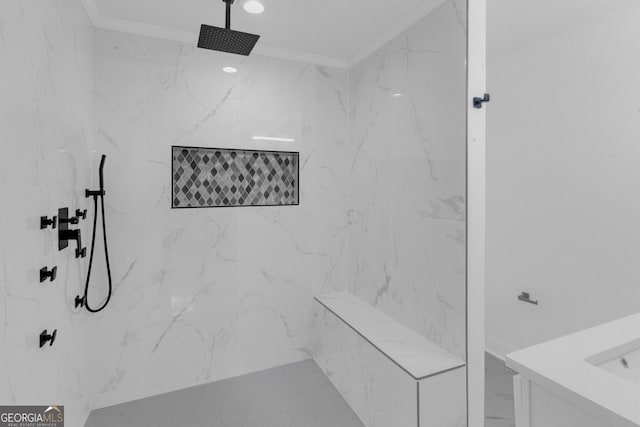 bathroom featuring tiled shower, vanity, and ornamental molding