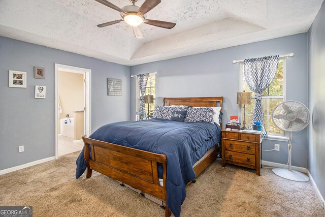 bathroom with tile patterned floors and independent shower and bath