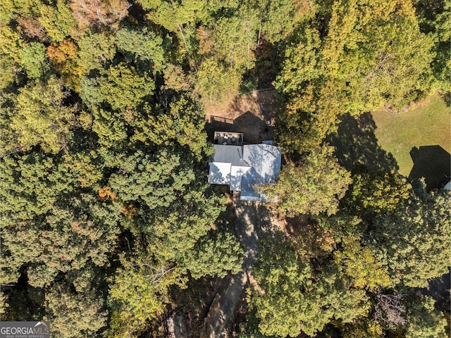 aerial view featuring a view of trees