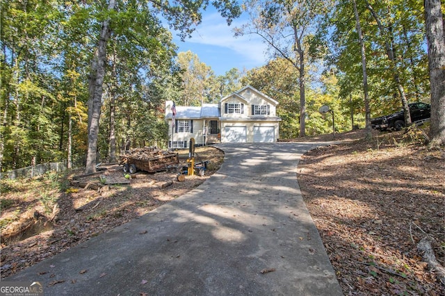 view of front of property with a garage