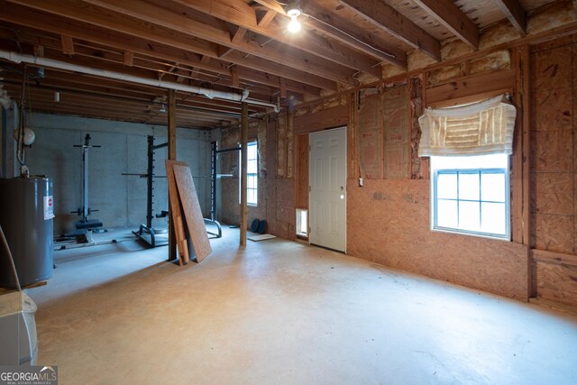 basement featuring water heater