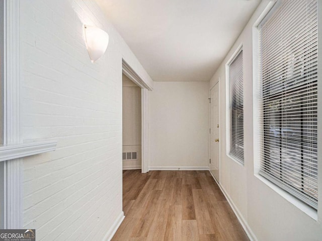 hallway featuring light hardwood / wood-style floors