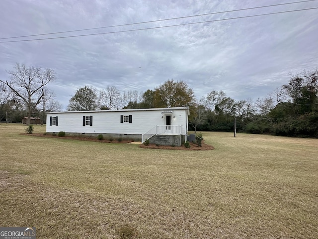 view of front of home with a front yard