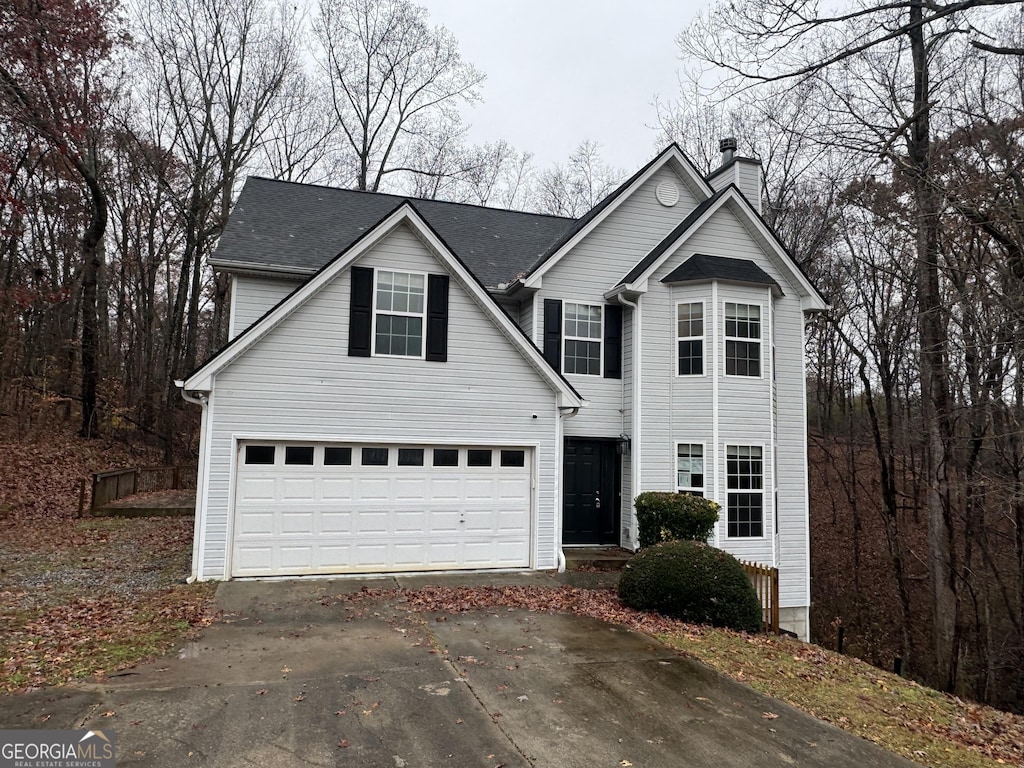 view of property with a garage