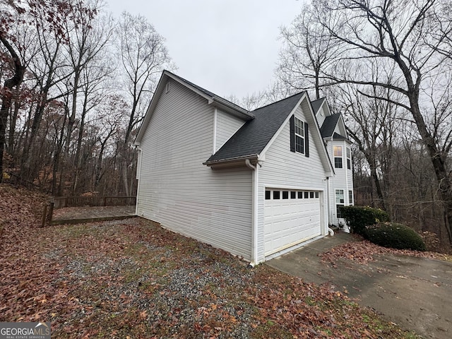 view of home's exterior with a garage