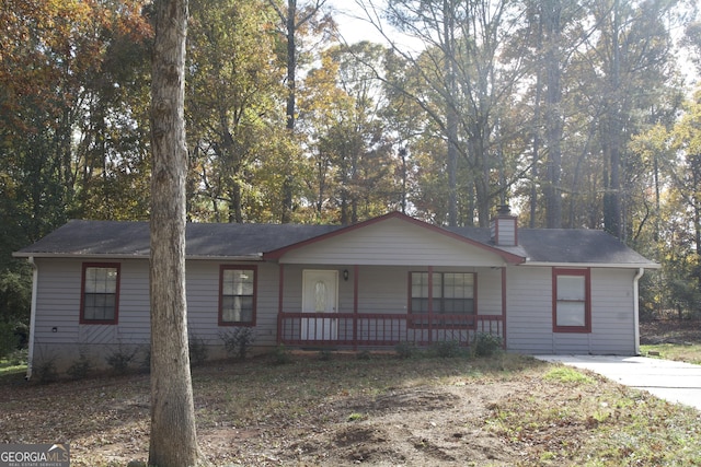 ranch-style home with a porch