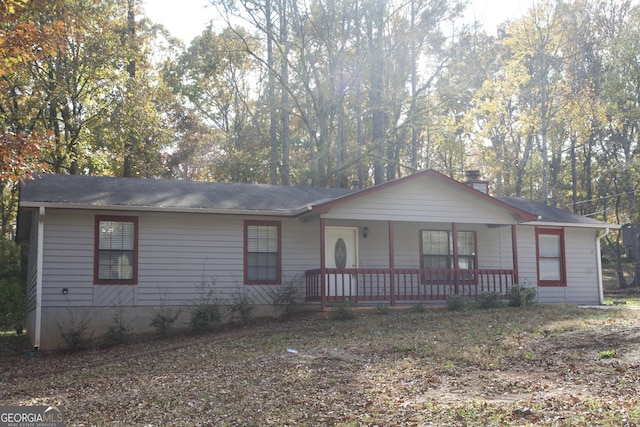 ranch-style house with covered porch