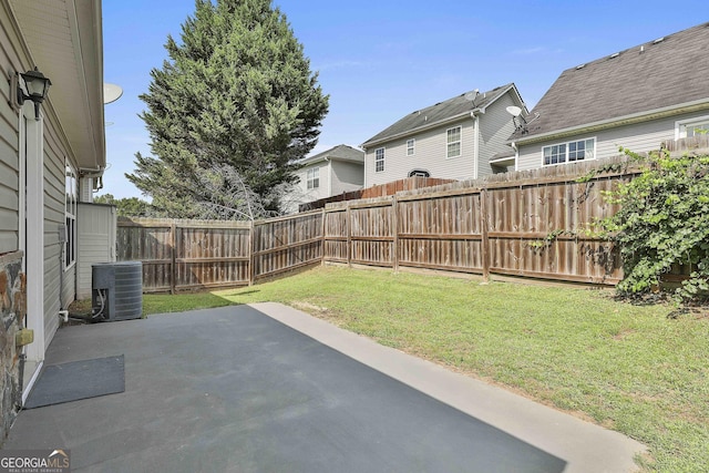 view of yard featuring a patio and cooling unit