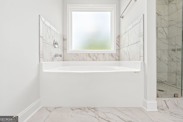 553 Lago Ct, Lagrange, GA 30241 - bathroom featuring a bath, baseboards, a marble finish shower, and marble finish floor
