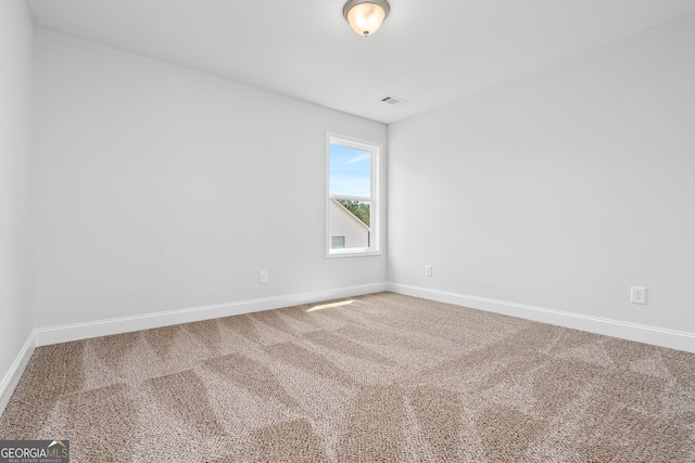 553 Lago Ct, Lagrange, GA 30241 - unfurnished room featuring baseboards, visible vents, and carpet