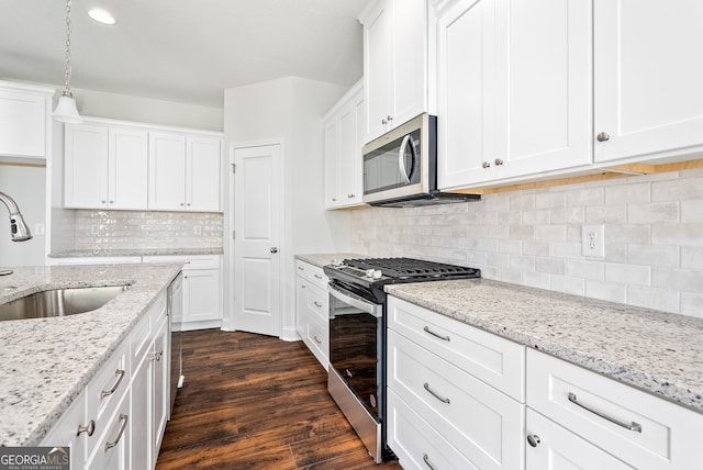 553 Lago Ct, Lagrange, GA 30241 - kitchen featuring a sink, white cabinets, stainless steel appliances, and dark wood finished floors