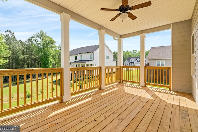 553 Lago Ct, Lagrange, GA 30241 - wooden deck featuring a residential view, ceiling fan, and a yard