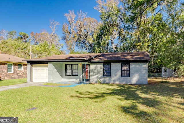 single story home with a front lawn and a garage