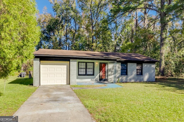 ranch-style home featuring a garage and a front lawn