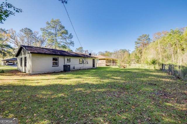 exterior space featuring central AC unit