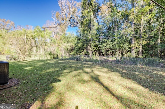 view of yard featuring central AC