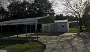 view of patio / terrace with a carport