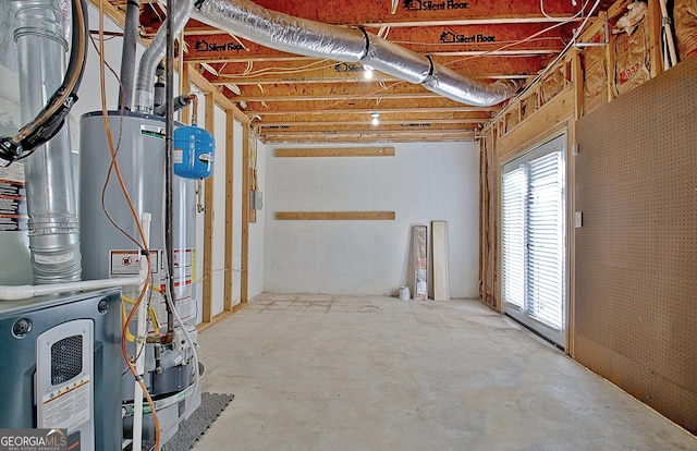 basement featuring water heater