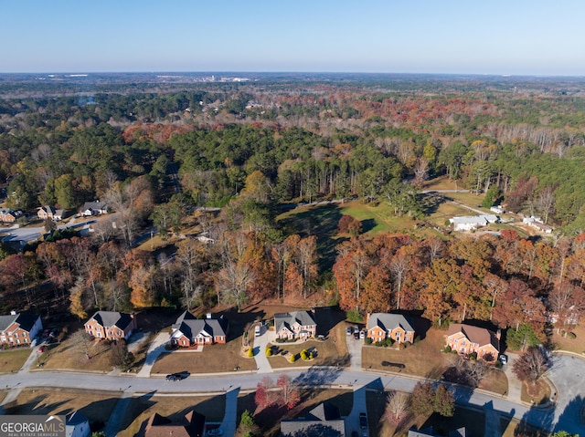 aerial view featuring a residential view and a view of trees