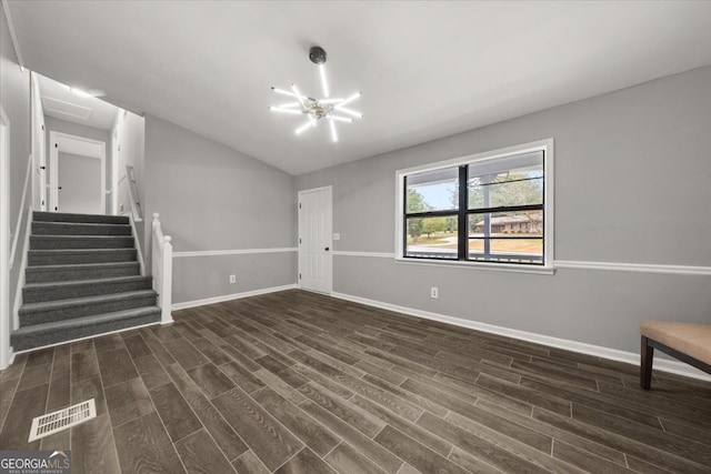 unfurnished living room featuring dark wood-type flooring