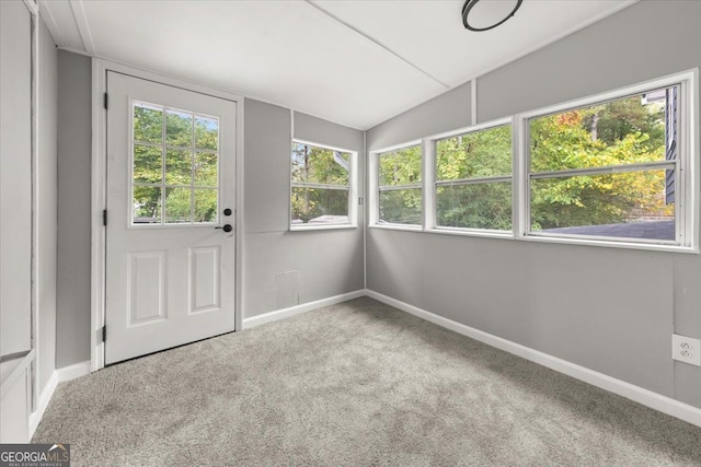 unfurnished sunroom with lofted ceiling