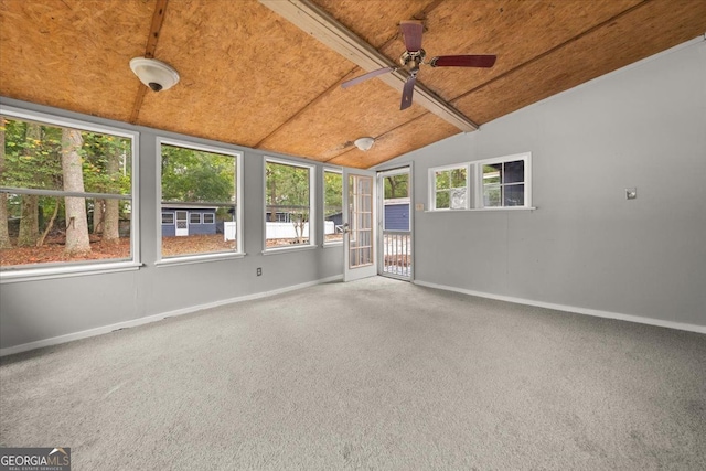 unfurnished sunroom featuring ceiling fan, wooden ceiling, and vaulted ceiling