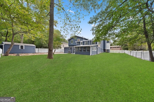 view of yard featuring a sunroom