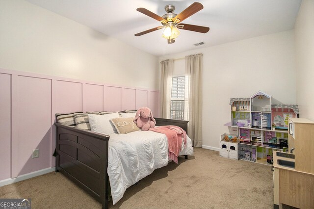 carpeted bedroom featuring ceiling fan