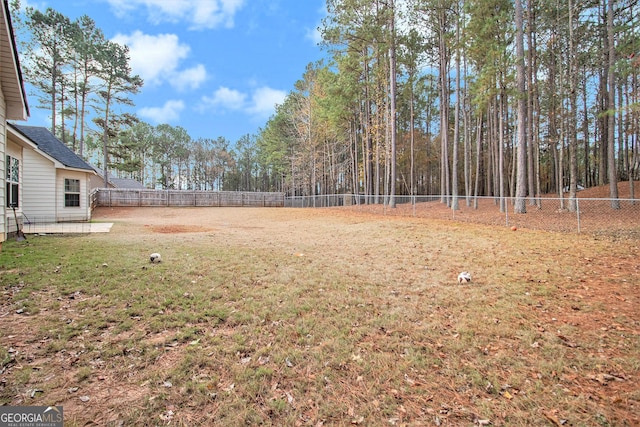 view of yard featuring a fenced backyard