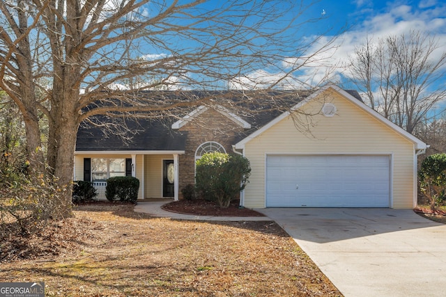 ranch-style home with a porch and a garage