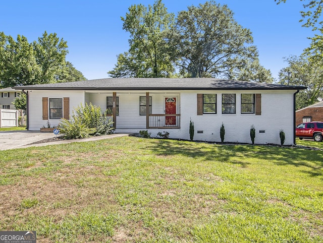 single story home with covered porch and a front lawn