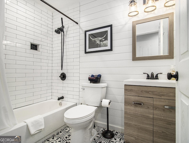 full bathroom with tile patterned floors, vanity, shower / tub combo, and toilet