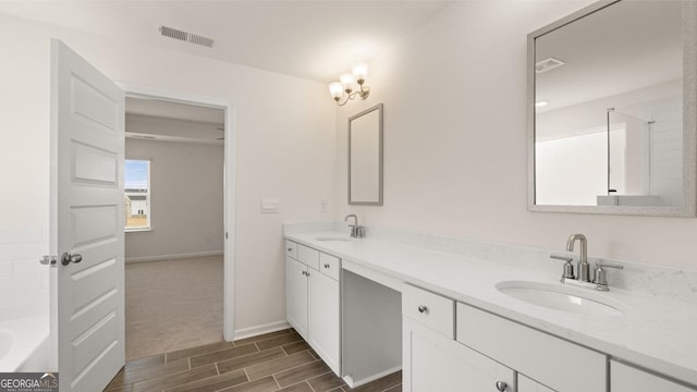 bathroom featuring wood-type flooring, vanity, and walk in shower