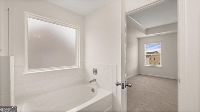 bathroom featuring a tub