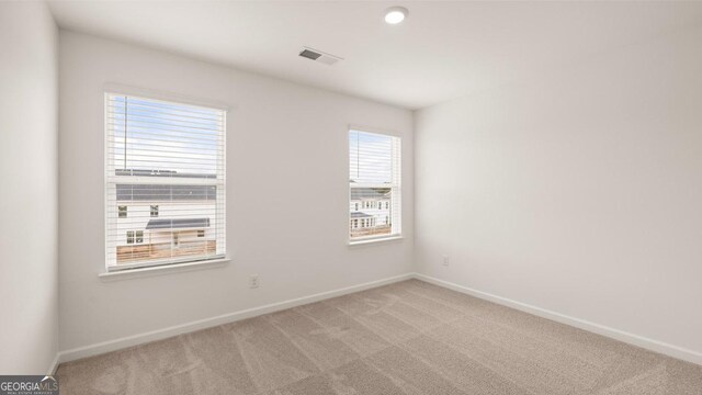 view of carpeted spare room