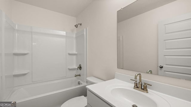 full bathroom featuring bathing tub / shower combination, vanity, and toilet