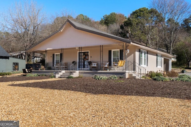 view of front of house featuring covered porch