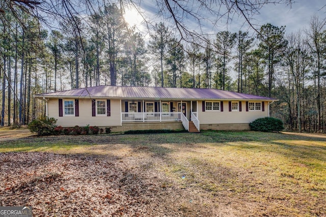 single story home with a front lawn and a porch